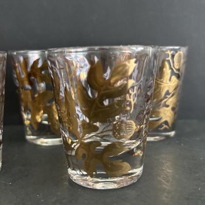 LOT 92: Sheffield Silve Plated Ice Bucket w/Lion Handles, Etched Pink Depressio Glasses (2), Etched Pilsner Glasses (3), MCM Gold Oak...
