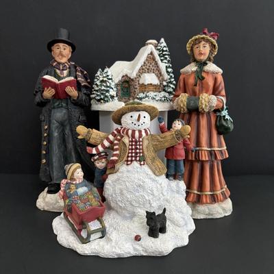 LOT 94: Sherri Buck Baldwin "Weekend Play" Figure, Thomas Kinkade Tele Flora Candle Holder & Holiday Caroling Figures