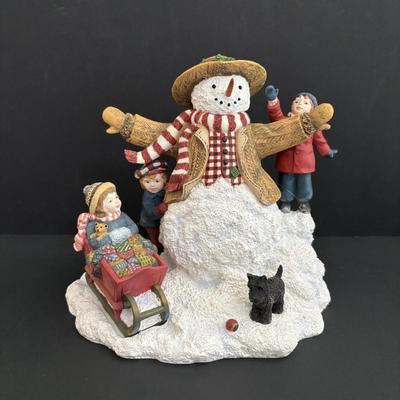 LOT 94: Sherri Buck Baldwin "Weekend Play" Figure, Thomas Kinkade Tele Flora Candle Holder & Holiday Caroling Figures