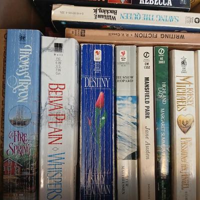 Large assortment of Paperback books - Elizabeth Peters - Jimmy Buffet - Stuart Woods and other Great Authors