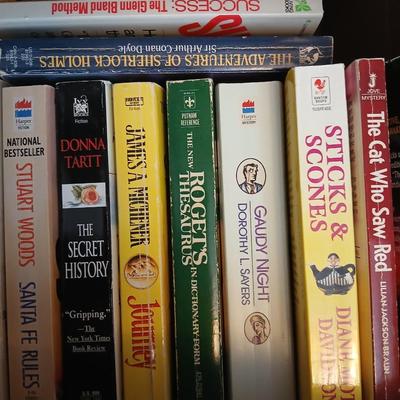 Large assortment of Paperback books - Elizabeth Peters - Jimmy Buffet - Stuart Woods and other Great Authors