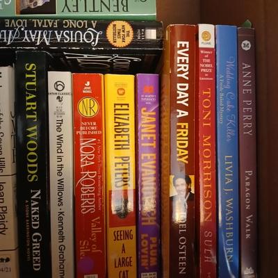 Large assortment of Paperback books - Elizabeth Peters - Jimmy Buffet - Stuart Woods and other Great Authors