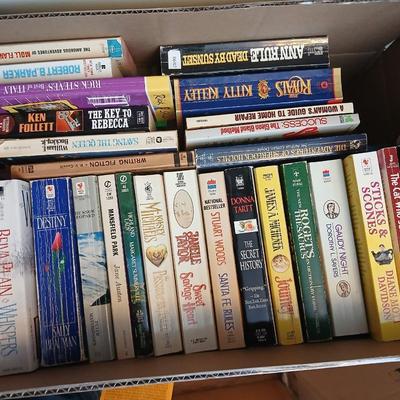 Large assortment of Paperback books - Elizabeth Peters - Jimmy Buffet - Stuart Woods and other Great Authors