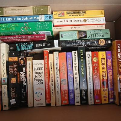 Large assortment of Paperback books - Elizabeth Peters - Jimmy Buffet - Stuart Woods and other Great Authors