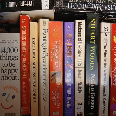 Large assortment of Paperback books - Elizabeth Peters - Jimmy Buffet - Stuart Woods and other Great Authors