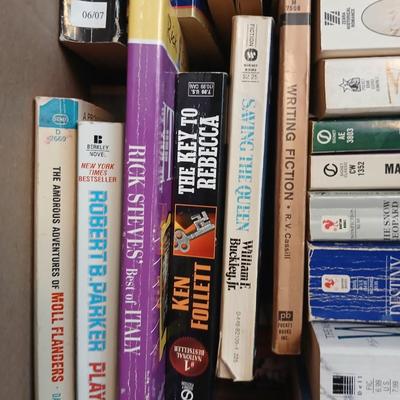 Large assortment of Paperback books - Elizabeth Peters - Jimmy Buffet - Stuart Woods and other Great Authors