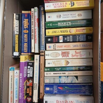 Large assortment of Paperback books - Elizabeth Peters - Jimmy Buffet - Stuart Woods and other Great Authors