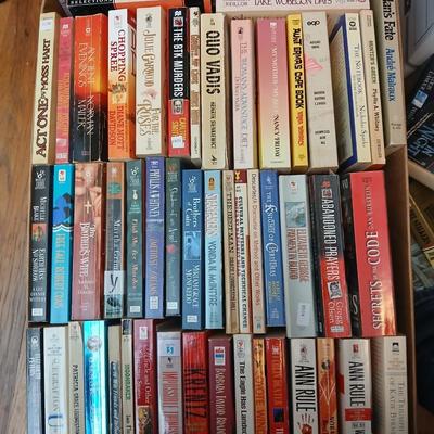 Box full of Paperback books - Robin Cook - Ann Rule - John Sandford and other fantastic authors