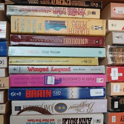 Box full of Paperback books - Robin Cook - Ann Rule - John Sandford and other fantastic authors
