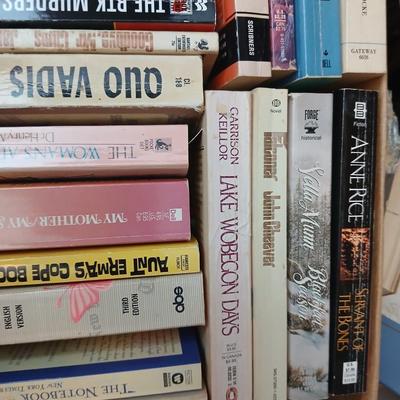 Box full of Paperback books - Robin Cook - Ann Rule - John Sandford and other fantastic authors