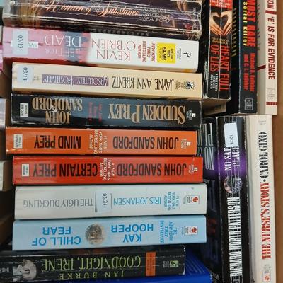 Box full of Paperback books - Robin Cook - Ann Rule - John Sandford and other fantastic authors