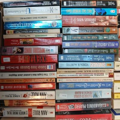 Box full of Paperback books - Robin Cook - Ann Rule - John Sandford and other fantastic authors