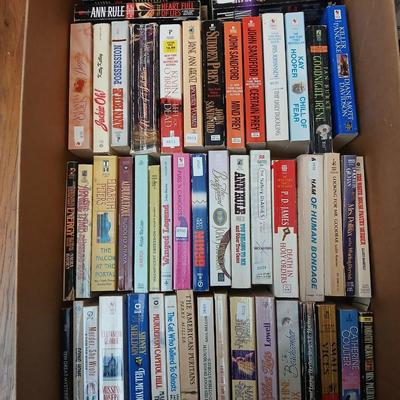 Box full of Paperback books - Robin Cook - Ann Rule - John Sandford and other fantastic authors
