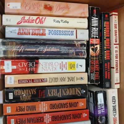 Box full of Paperback books - Robin Cook - Ann Rule - John Sandford and other fantastic authors