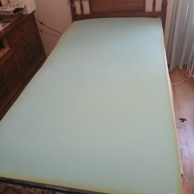 Twin sized bed nice wooden headboard bed with bedding and excellent older mattress and Boxsprings
