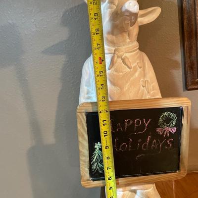 Pig with sign statue