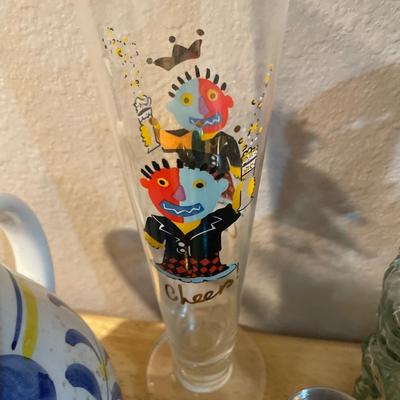 Mics shot glasses and some glass decor with wood heads