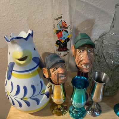 Mics shot glasses and some glass decor with wood heads