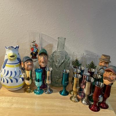 Mics shot glasses and some glass decor with wood heads