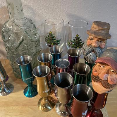 Mics shot glasses and some glass decor with wood heads