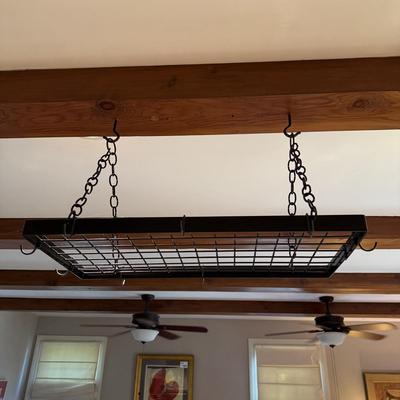 Sale Photo Thumbnail #2056: Measurements;
28.5” in width, 13.5” in depth
Comes with eight hanging hooks, two ceiling mounted hooks, and chain for hanging.