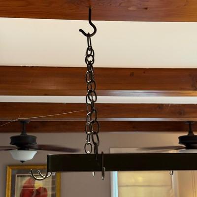 Sale Photo Thumbnail #2058: Measurements;
28.5” in width, 13.5” in depth
Comes with eight hanging hooks, two ceiling mounted hooks, and chain for hanging.