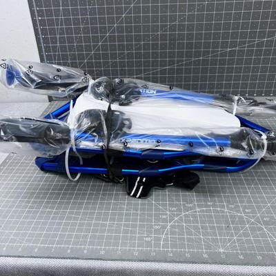 Sale Photo Thumbnail #651: Brand new snow shoe package includes snowshoes w/bindings , 2 poles and bag. Blue color, weight up to 150 pounds, 21 long.