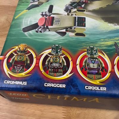 Sale Photo Thumbnail #680: A transformative aquatic battle set that combines intricate design with dynamic play features for young builders seeking imaginative adventures.

• Includes 6 unique minifigures
• Movable crane and weapon systems
• Detachable smaller vehicles
• Tr