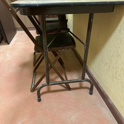 4 FOOT FOLDING TABLE AND 3 FOLDING CHAIRS