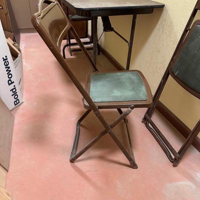 4 FOOT FOLDING TABLE AND 3 FOLDING CHAIRS
