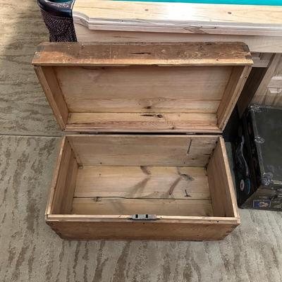 WOODEN TRUNK FROM A FOREIGN COUNTRY AND A METAL TRUNK