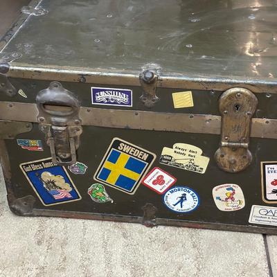 WOODEN TRUNK FROM A FOREIGN COUNTRY AND A METAL TRUNK