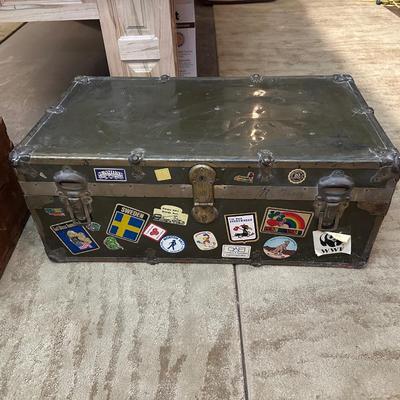 WOODEN TRUNK FROM A FOREIGN COUNTRY AND A METAL TRUNK