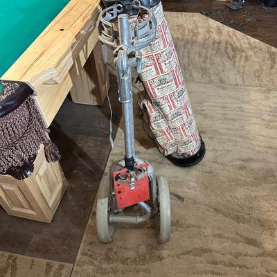 SET OF GOLF CLUBS, BUDWEISER BAG, GOLF BALLS AND DOLLY