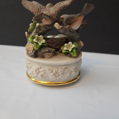 His eye is on the sparrow & Amazing Grace" Sparrow club music box & Signed Roger Williams porcelain Music box