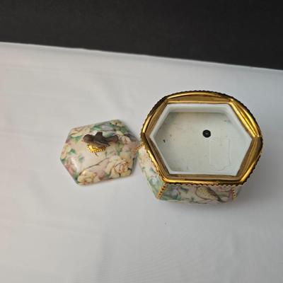 His eye is on the sparrow & Amazing Grace" Sparrow club music box & Signed Roger Williams porcelain Music box