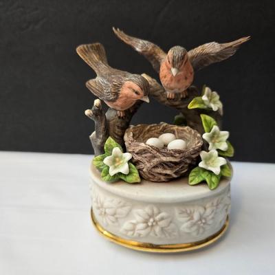 His eye is on the sparrow & Amazing Grace" Sparrow club music box & Signed Roger Williams porcelain Music box