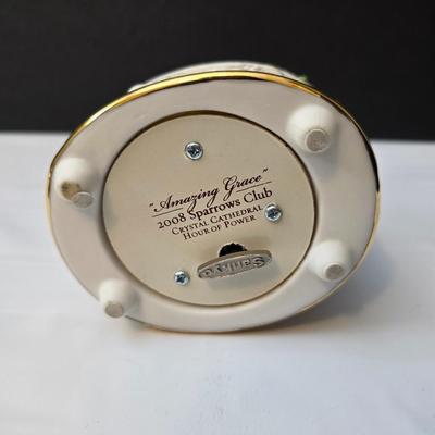 His eye is on the sparrow & Amazing Grace" Sparrow club music box & Signed Roger Williams porcelain Music box