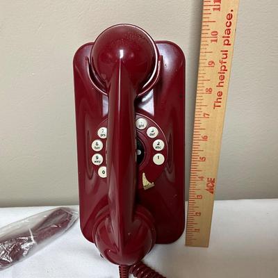 Maroon wall mounted corded phone