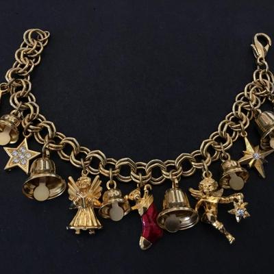 Beautiful gold tone, cherub angel Christmas charm bracelet, vintage