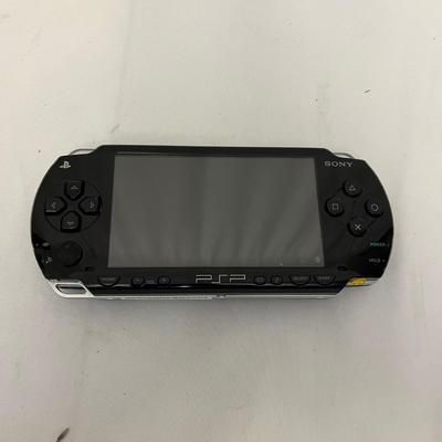 Sony PSP With Movies, NYKO Speaker Case & More (G-MG)