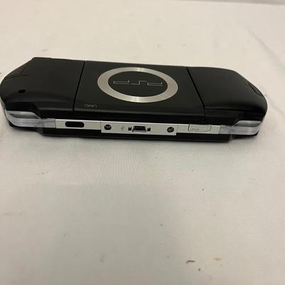 Sony PSP With Movies, NYKO Speaker Case & More (G-MG)