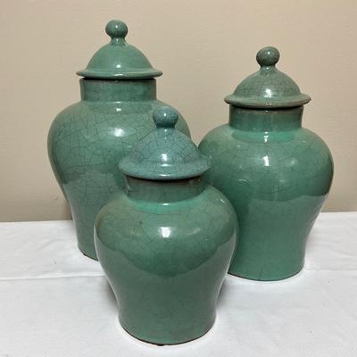 3 teal decor containers