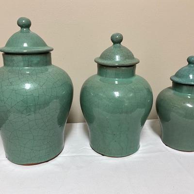 3 teal decor containers