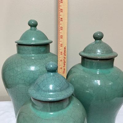 3 teal decor containers