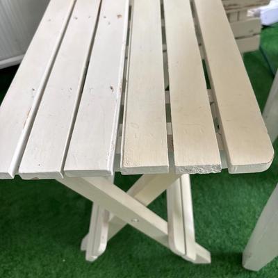 3 white patio tables
