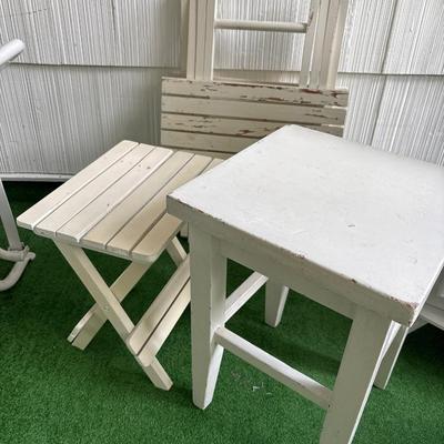 3 white patio tables