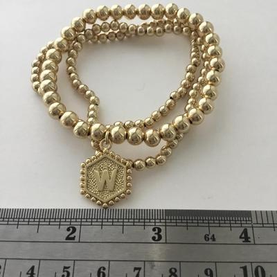 Gold tone multi bracelets