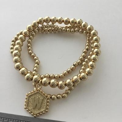 Gold tone multi bracelets