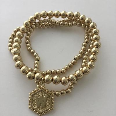 Gold tone multi bracelets